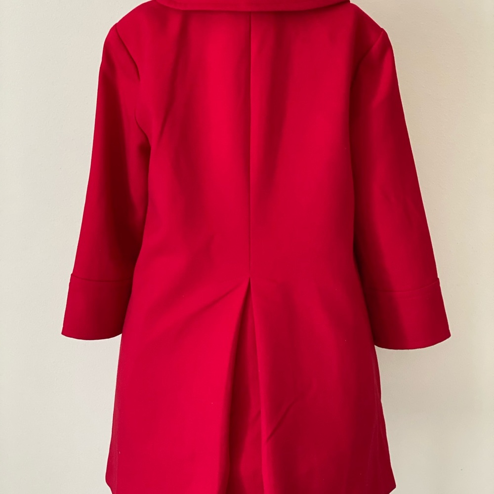Carmen Marc Volvo red coat with buttons.